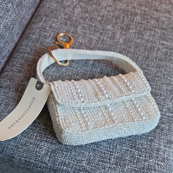 Anthropologie Handbags - Anthroplogie Small White Bag Or Bag Charm